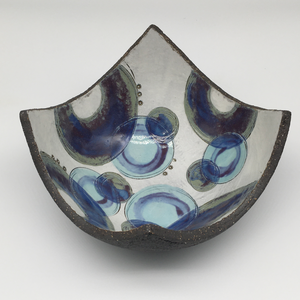 Bowl - Textured black with many blue circles and purple crescents